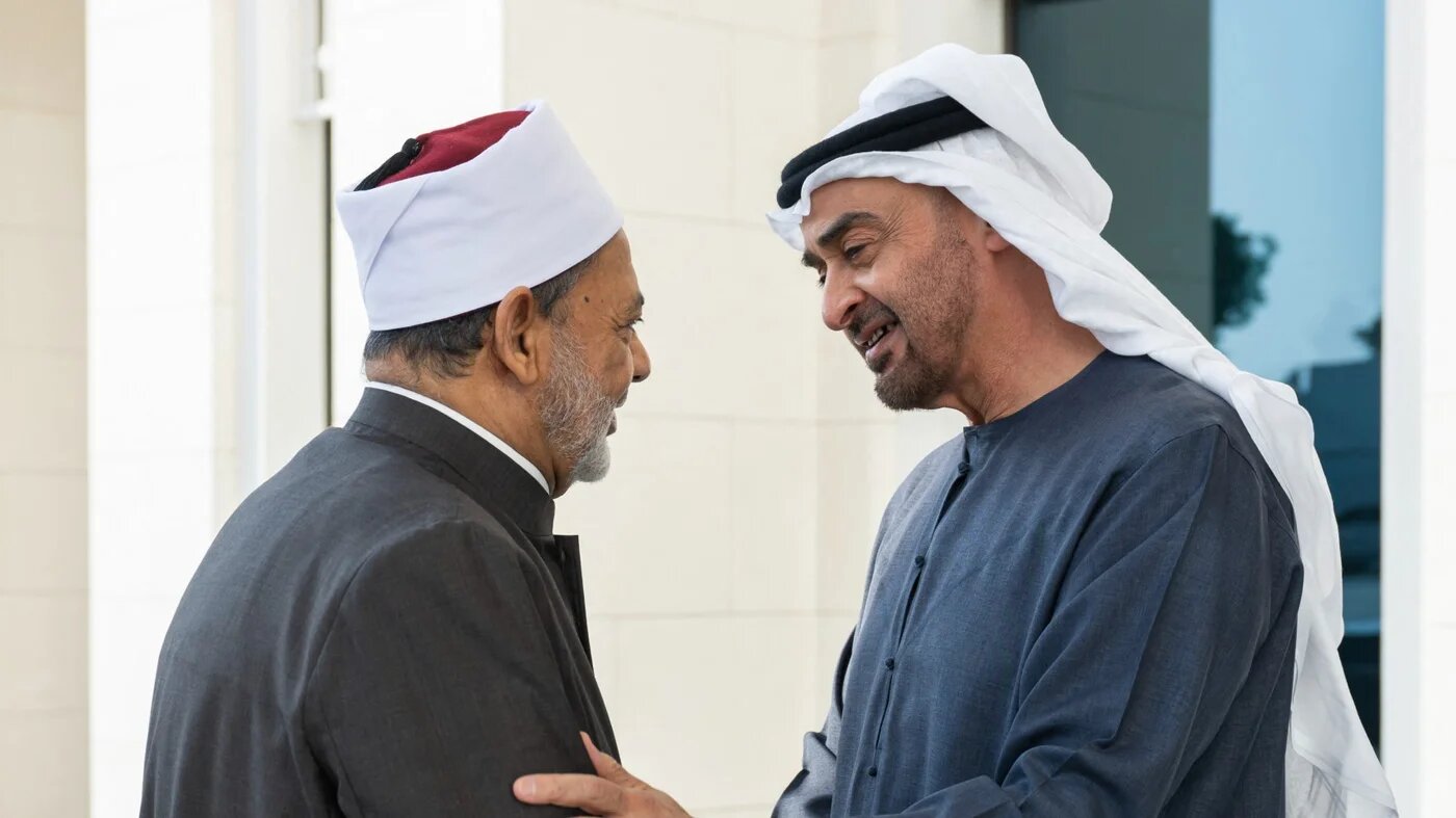 This handout picture provided by the UAE Presidential Court shows UAE President Mohammed bin Zayed Al Nahyan (R) receiving Ahmed al-Tayeb, grand imam of al-Azhar and chairman of the Muslim Council of Elders, at al-Shati Palace in Abu Dhabi on July 12, 2024. Abdulla AL-NEYADI / UAE PRESIDENTIAL COURT / AFP