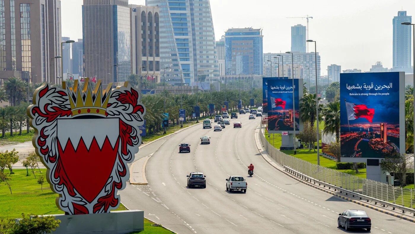 Vehicles move on a road in Bahrain's capital Manama on 11 March 2026 (AFP)