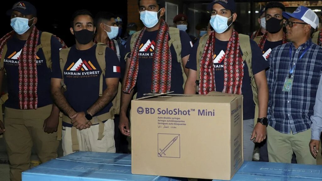 Sheikh Mohamed Hamad Mohamed Al Khalifa (second right) poses for pictures upon arriving at Tribhuvan International Airport in Kathmandu.