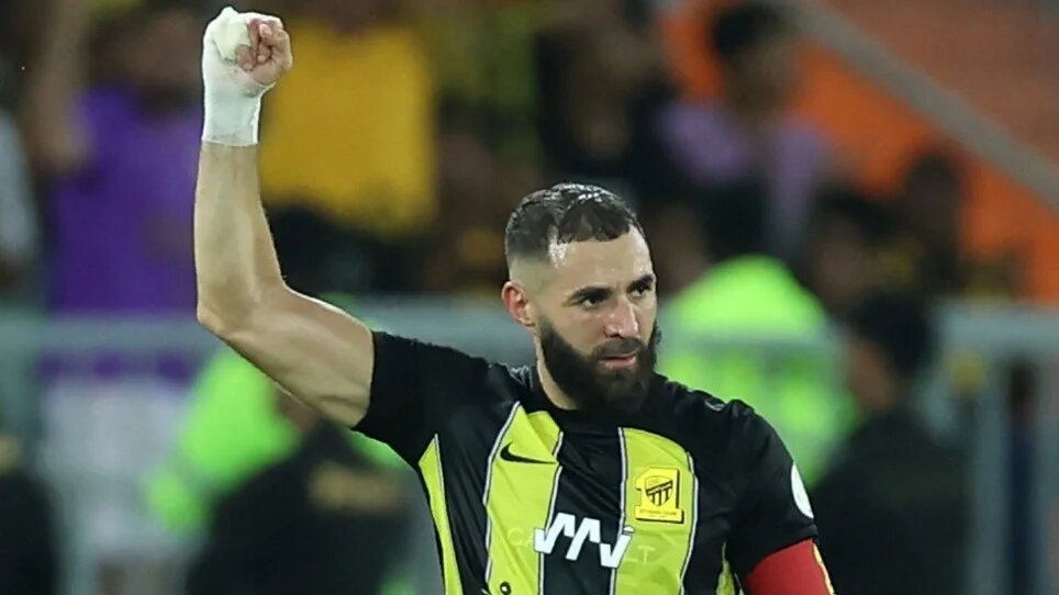 Ittihad's French forward #09 Karim Benzema reacts after scoring a goal during the Saudi Pro League football match between Al-Ittihad and Al-Hilal at Prince Abdullah al-Faisal Stadium in Jeddah on 1 September 2023 (AFP)