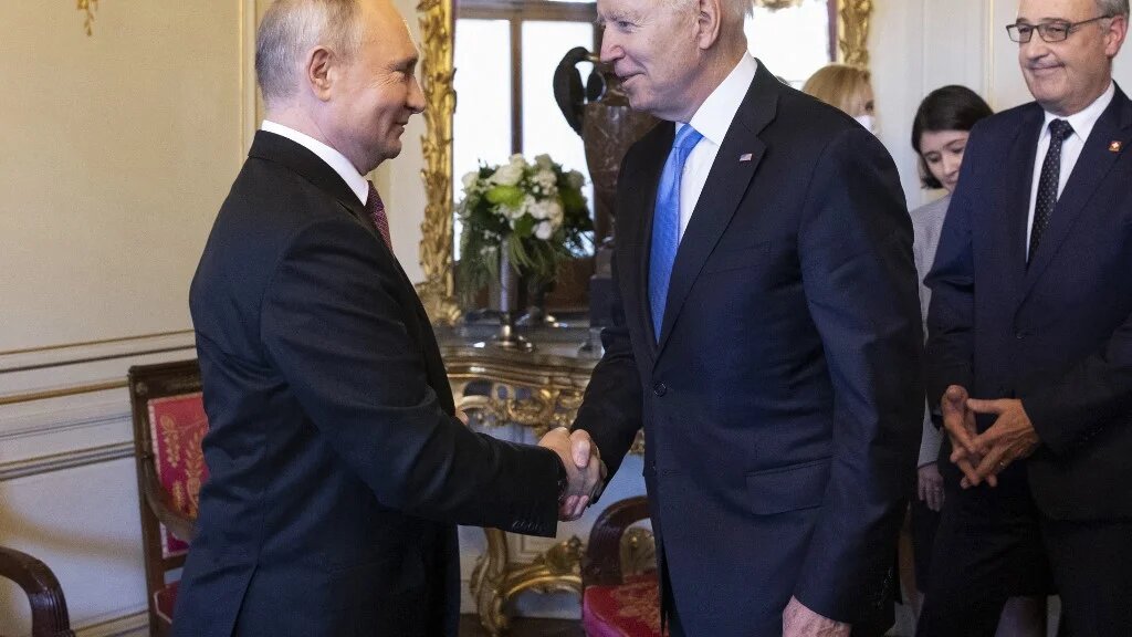 US President Joe Biden shakes hands with Russian President Vladimir Putin prior to the US-Russia summit in Geneva.