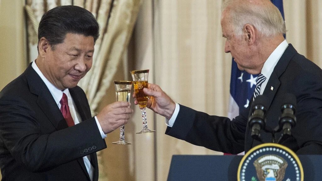 Biden, then vice-president, and Chinese President Xi Jinping toast during a state luncheon in September 2015.