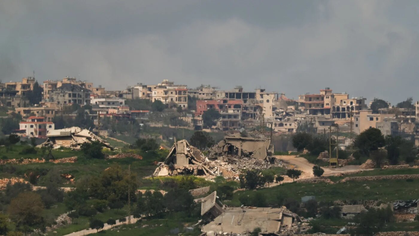 Destroyed buildings in Bint Jbeil, southern Lebanon, as seen from the Israeli side of the border in northern Israel, 13 April 2026 (Reuters/Florion Goga)