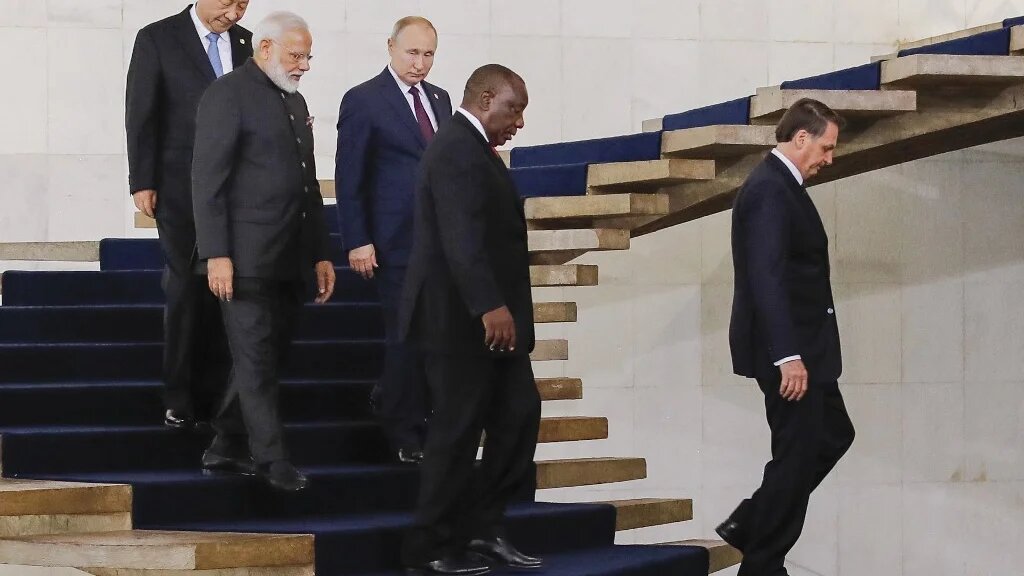 Le président chinois Xi Jinping, le Premier ministre indien Narendra Modi, le président russe Vladimir Poutine, le président sud-africain Cyril Ramaphosa et le président brésilien Jair Bolsonaro au onzième sommet des BRICS, le 4 novembre 2019 au Brésil (AFP/Sergio Lima)