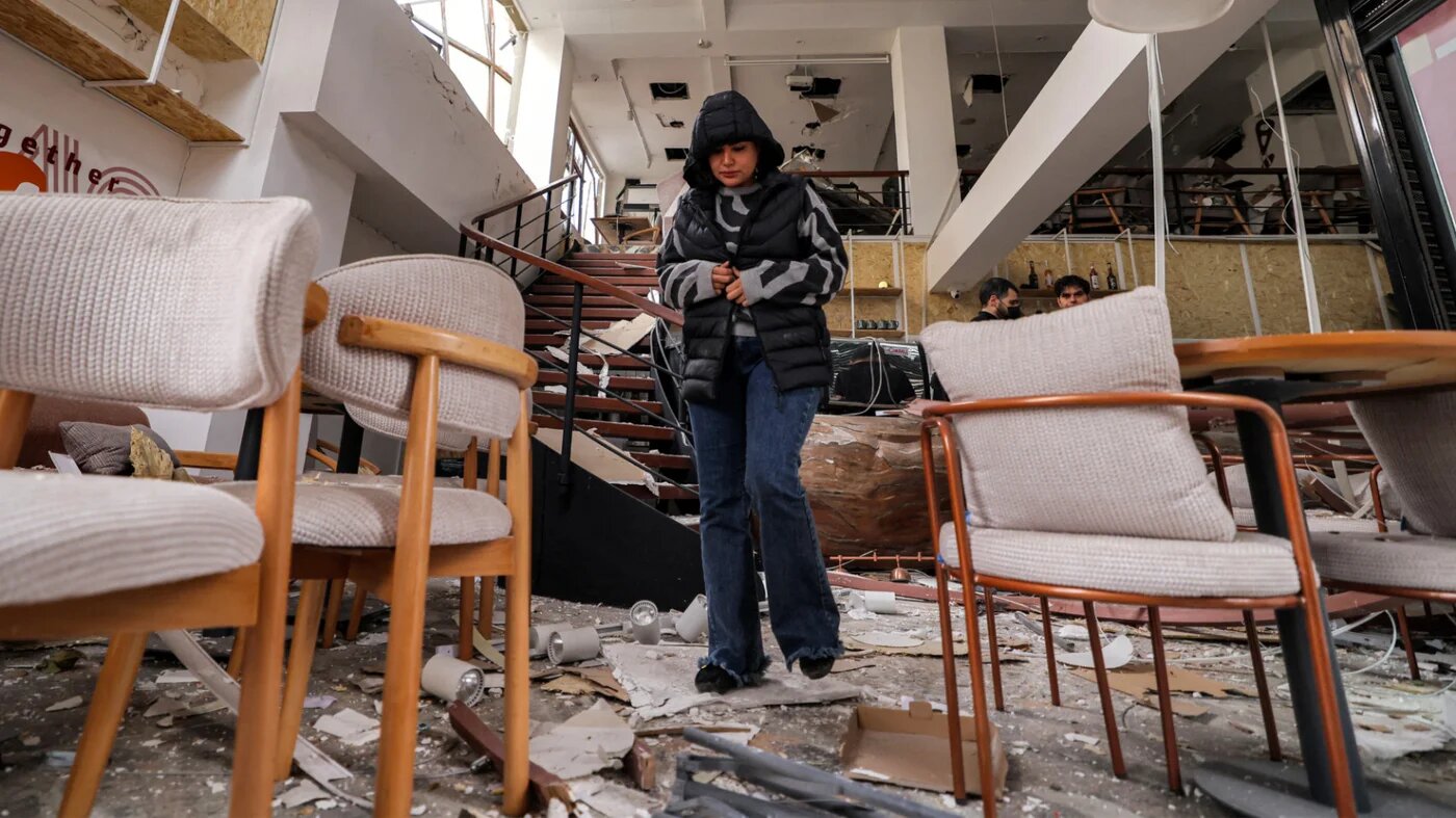 Cafe staff inspect the destruction at the premises following a US-Israeli air strike on their building earlier in the day in Tehran on 29 March 2026 (Atta Kenare/AFP)