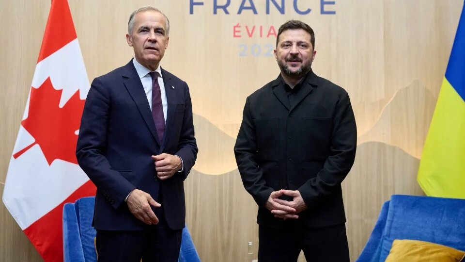 Canadian Prime Minister Mark Carney and Ukrainian President Volodymyr Zelensky attend the G7 summit in France on 16 June 2026 (Ukrainian Presidential Press Service/AFP)
