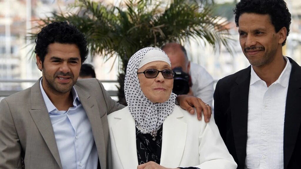 Chafia Boudraa à Cannes aux côtés de Djamel Debbouze et de Roschdy Zem, le 21 mai 2010 à Cannes, pour la présentation de Hors-la-loi (AFP/François Guillot)