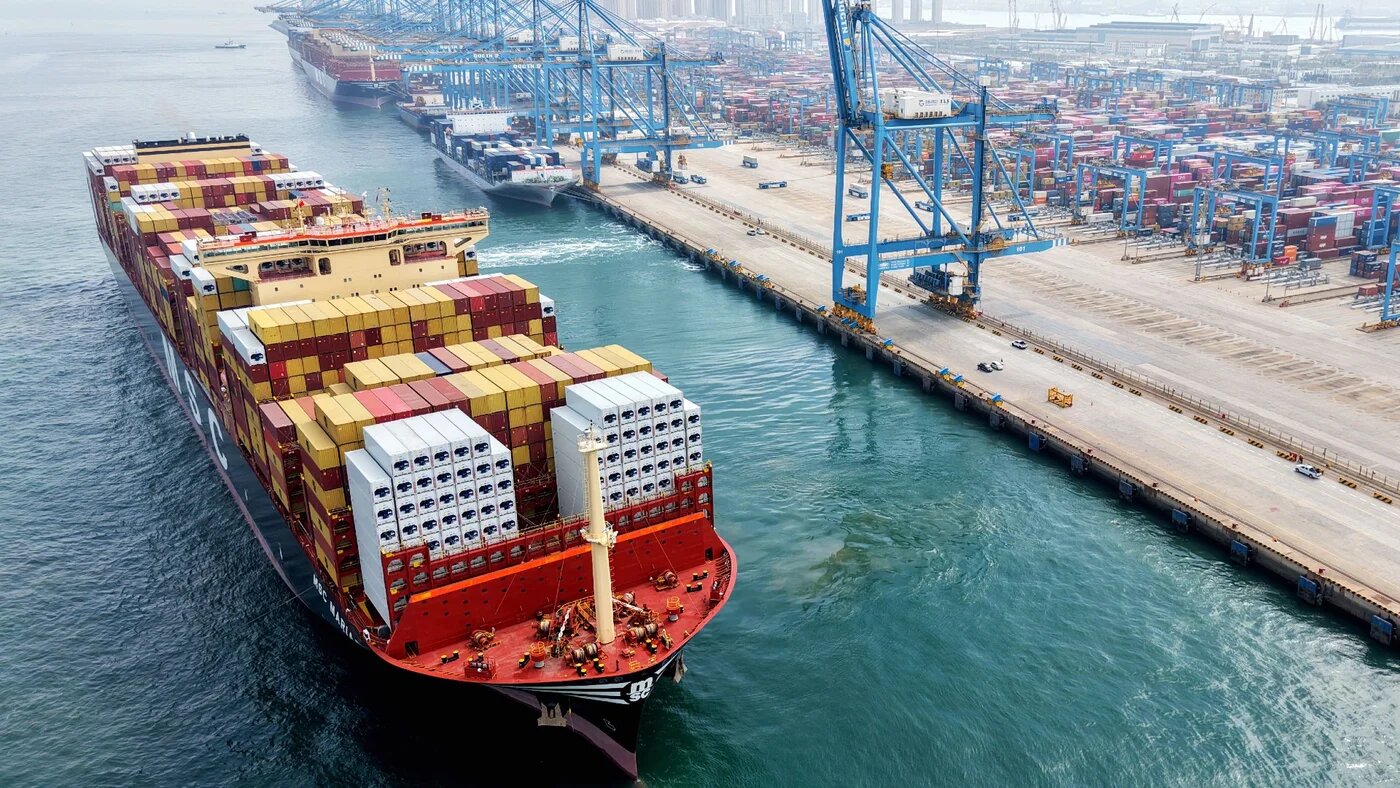 A cargo ship leaves a berth at the port in Qingdao, in China’s eastern Shandong province on 14 April 2026 (AFP/CN-STR)