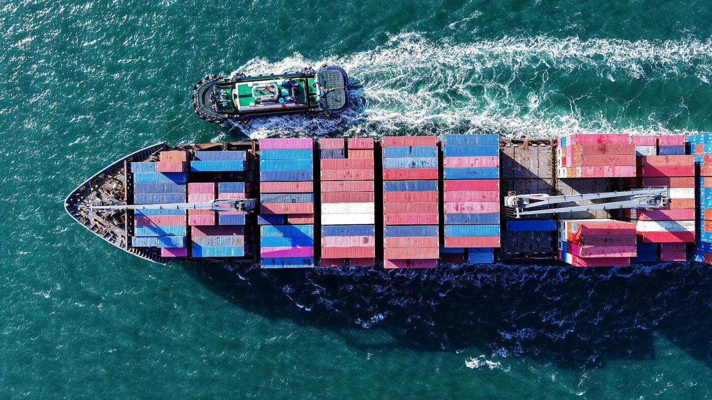 A container ship approaches a port in Qingdao, in eastern China's Shandong province on 2 April 2025 (AFP)