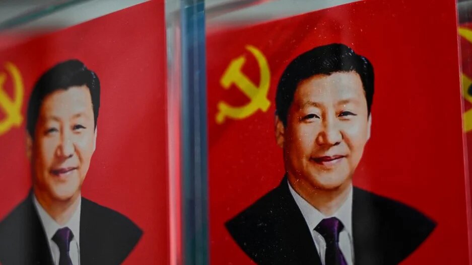 Portraits of Chinese President Xi Jinping are seen in Beijing on 4 March 2026 (Pedro Pardo/AFP)