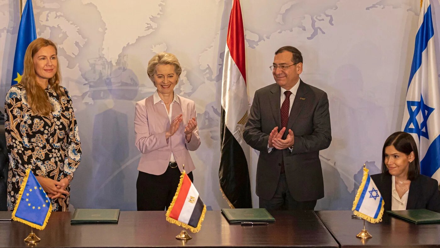EU Commissioner for Energy Kadri Simson, European Commission President Ursula von der Leyen, Egyptian Minister of Petroleum Tarek el-Molla, and Israeli Minister of Energy Karine Elharrar react after signing a trilateral natural gas deal in Cairo (AFP)