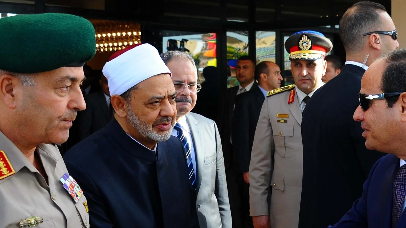 In this file photo, Egyptian Presidency shows Egyptian President Abdel Fattah al-Sisi (R) is greeting the Grand Imam of al-Azhar Sheikh Ahmed al-Tayeb on the first day of the Eid al-Adha holiday on 24 September 2015 in Cairo (AFP)