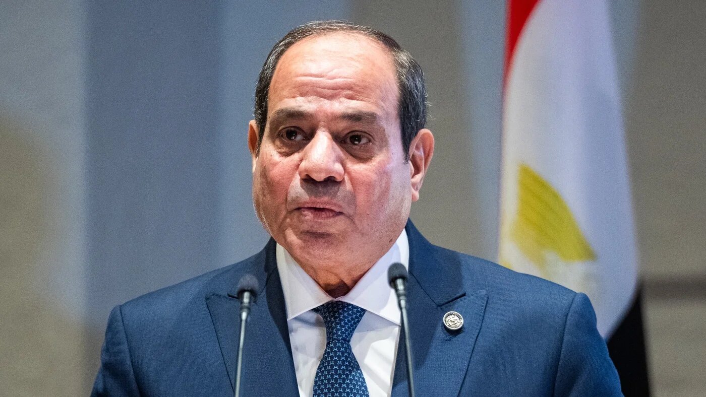 Egyptian President Abdel Fattah el-Sisi addresses guests at a business forum in Copenhagen, Denmark, on 6 December 2024 (AFP)