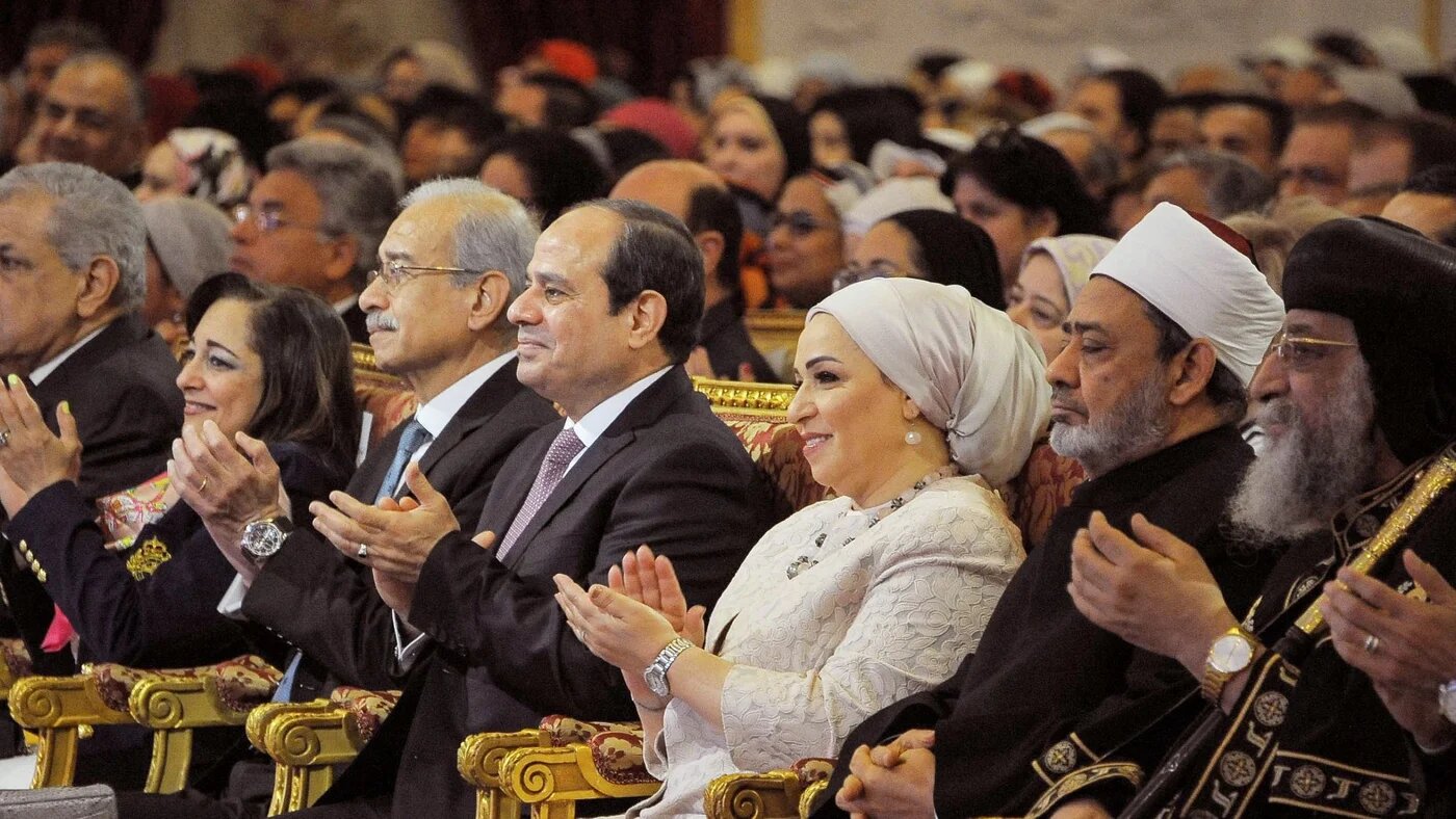 Egyptian President Abdel Fattah el-Sisi and his wife, Entissar Amer, attended a celebration honouring Egyptian women and mothers in Cairo on 21 March 2018 (AFP)