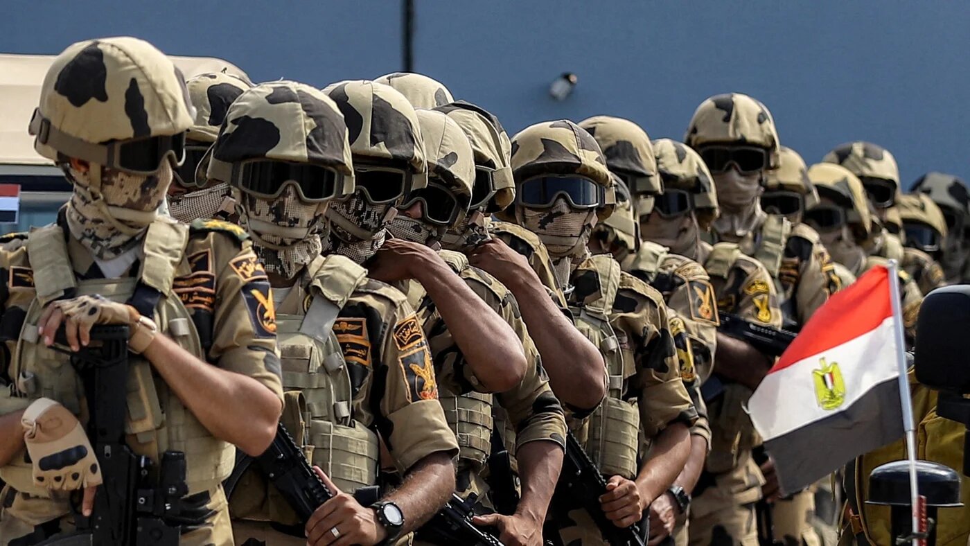 Egyptian army special forces soldiers deploy before the concrete barrier marking the border between Egypt and the Gaza Strip in Rafah in the east of North Sinai province on October 20, 2023 during a visit there by the United Nations secretary-general to oversee preparations for the delivery of humanitarian aid to the war-torn Palestinian enclave. Kerolos SALAH / AFP