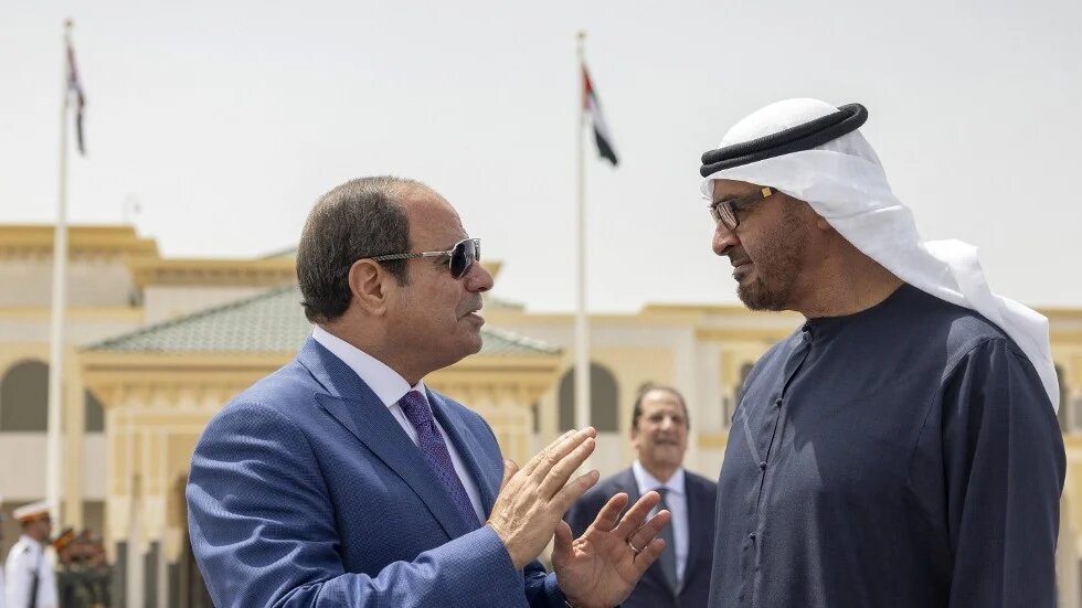 This handout image provided by the UAE Ministry of Presidential Affairs shows UAE President Sheikh Mohamed bin Zayed al-Nahyan (R) bidding farewell to Egypt's President Abdel Fattah al-Sisi at Abu Dhabi Presidential Airport on 19 September 2023 (AFP)
