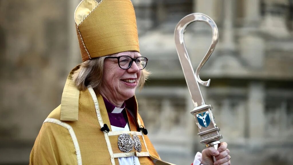 The Archbishop of Canterbury, Dame Sarah Mullally, departs Canterbury Cathedral in southeastern England on 25 March 2026 (Henry Nicholls/AFP)