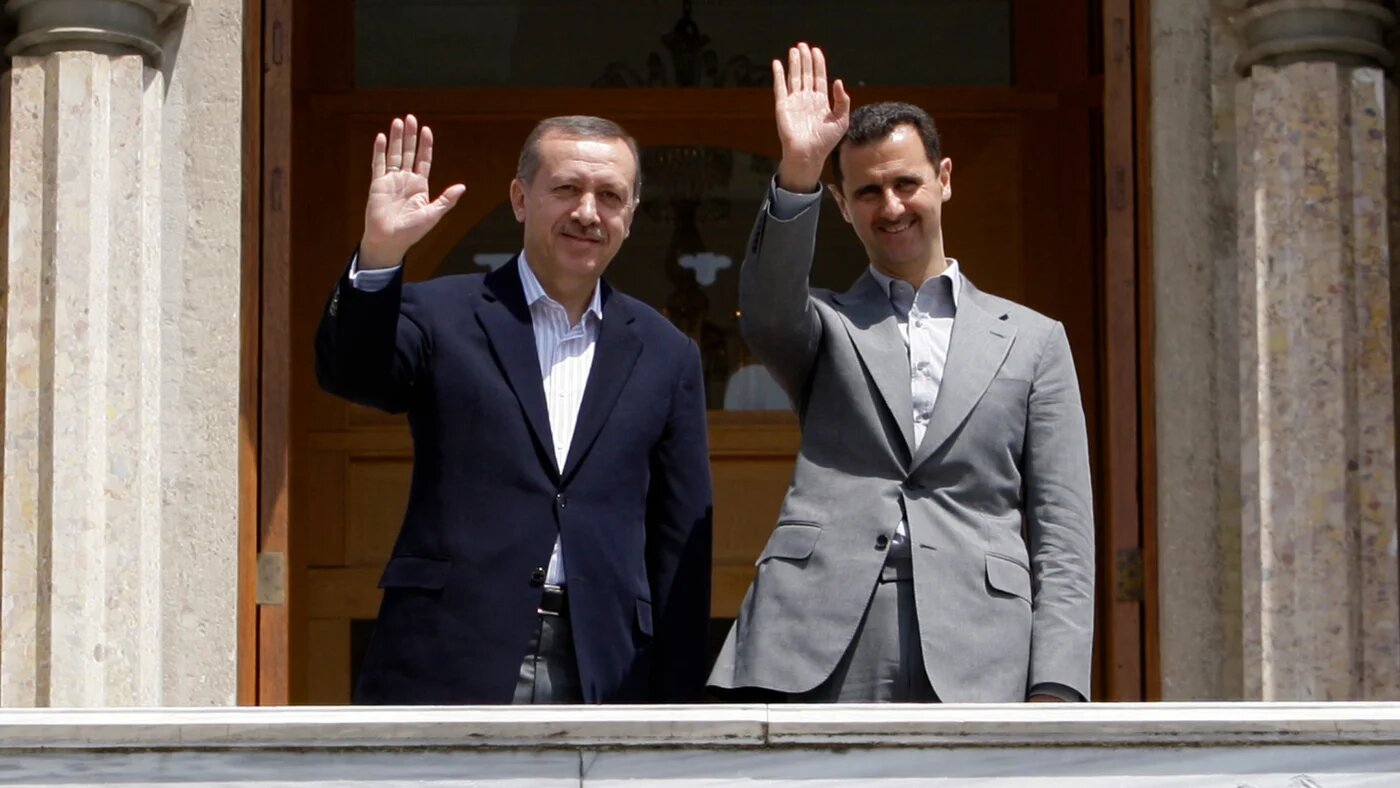 Former Syrian President Bashar al-Assad (R) and then-Turkish Prime Minister Recep Tayyip Erdogan pose on 9 May 2010 before an official meeting in Istanbul (AFP/Ibrahim Usta)