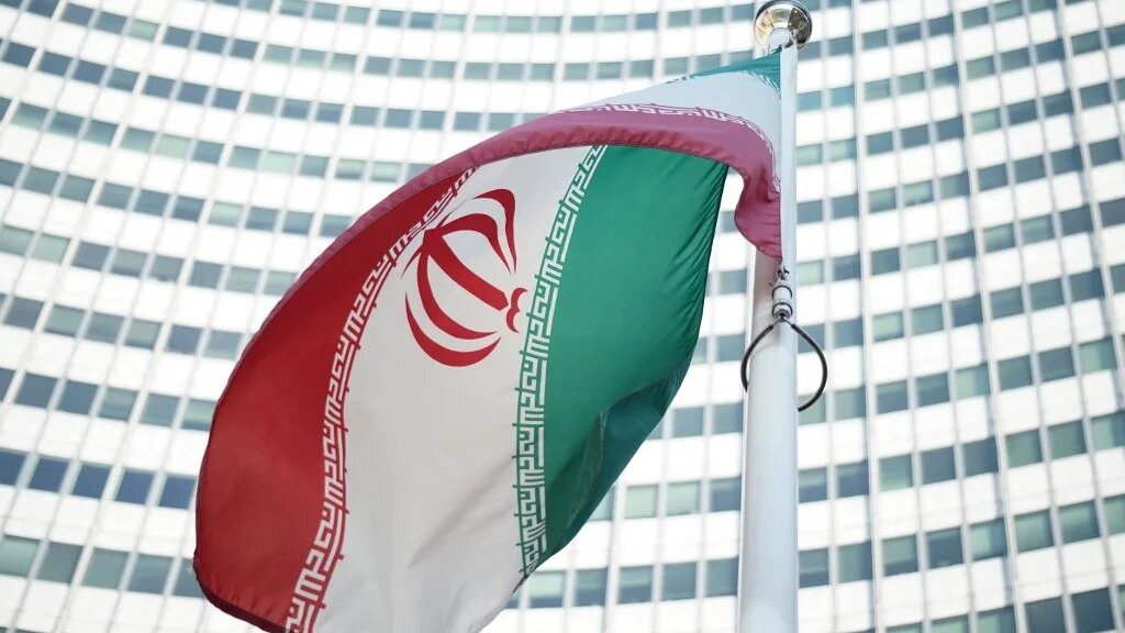 China's ambassador to the UN nuclear watchdog called on Washington to stop delaying the lifting of sanctions on Tehran.