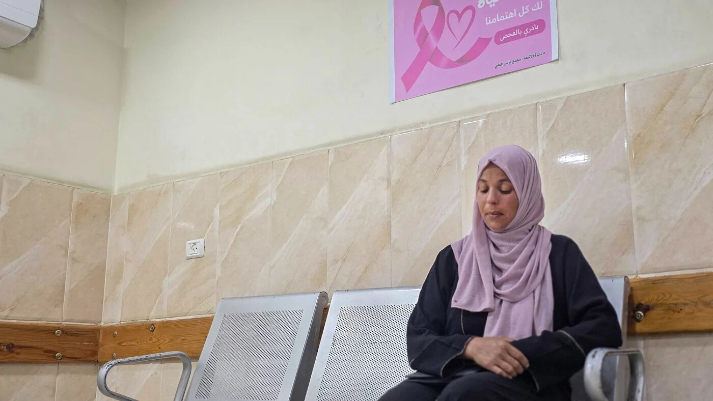 A Palestinian woman waits to undergo early breast cancer screening at Nasser Medical Complex in Khan Younis, in the southern Gaza Strip, on 6 October 2026 (Tariq Mohammad/APA Images via Reuters)