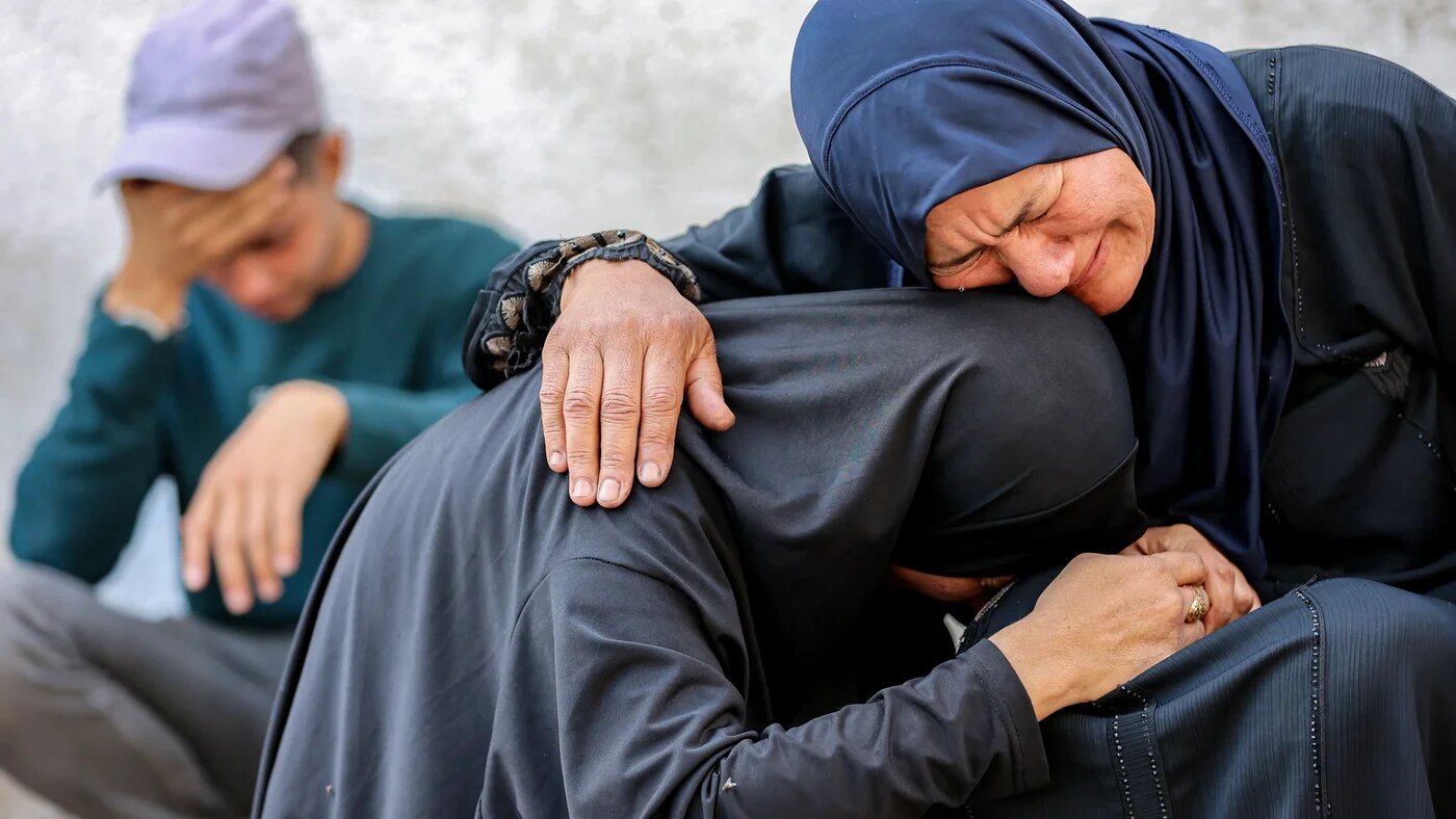 Palestinian women mourn victims killed during overnight Israeli attacks, at al-Shifa hospital in Gaza City on 4 June 2025 (AFP/Omar al-Qattaa)