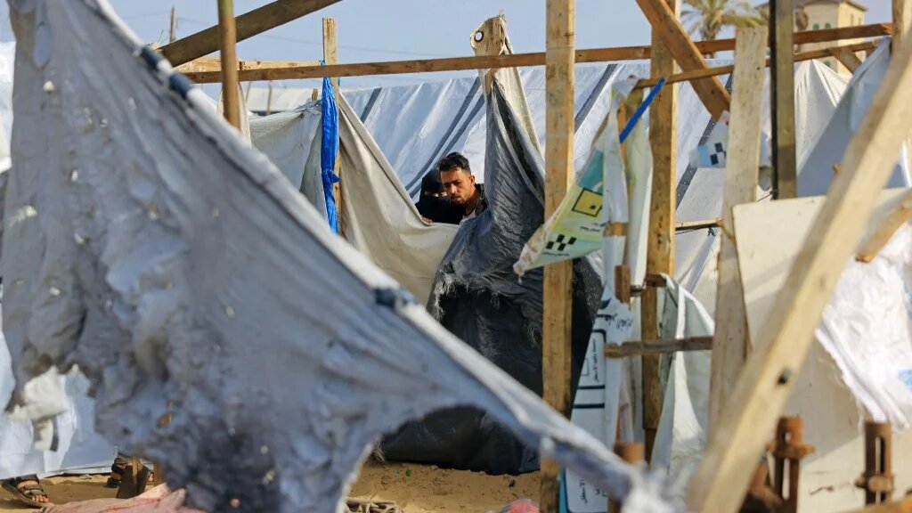 Tents housing displaced Palestinians in al-Mawasi, Gaza, are pictured on 30 January 2026, following Israeli strikes (Bashar Taleb/AFP)