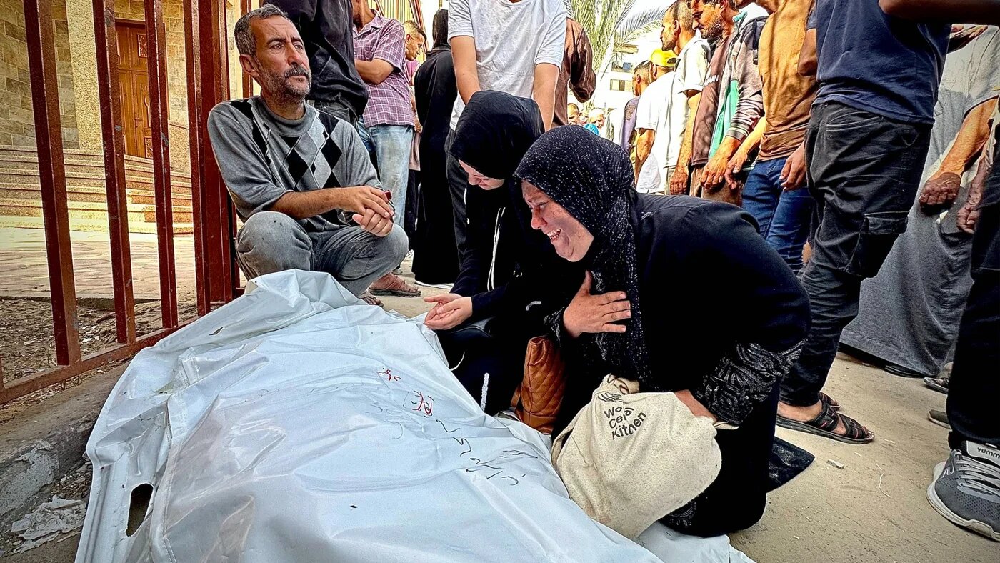 Palestinians mourn their loved ones killed whilst trying to obtain aid food from a Gaza Humanitarian Foundation (GHF) aid hub in Rafah in the southern Gaza Strip, on 1 June 2025 (Moaz Abu Taha/Reuters)
