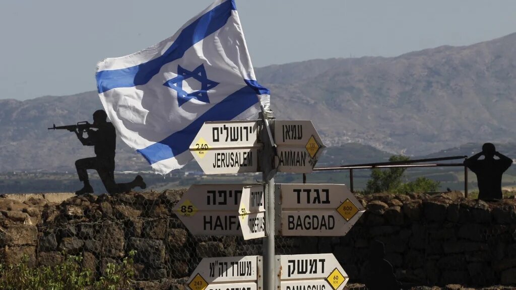 An Israeli flag is seen placed on Mount Bental in the occupied Golan Heights on 10 May 2018.