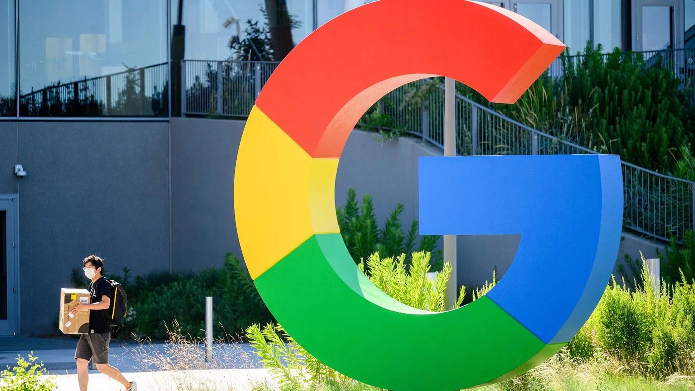 A worker walks along a path at Google’s Bay View campus in Mountain View, California on 27 June 2022.