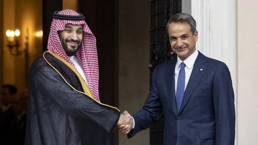 Greek Prime Minister Kyriakos Mitsotakis greets Saudi Crown Prince Mohammed bin Salman prior to a meeting in Athens on 26 July 2022 (Yorgos Karahalis/AFP)