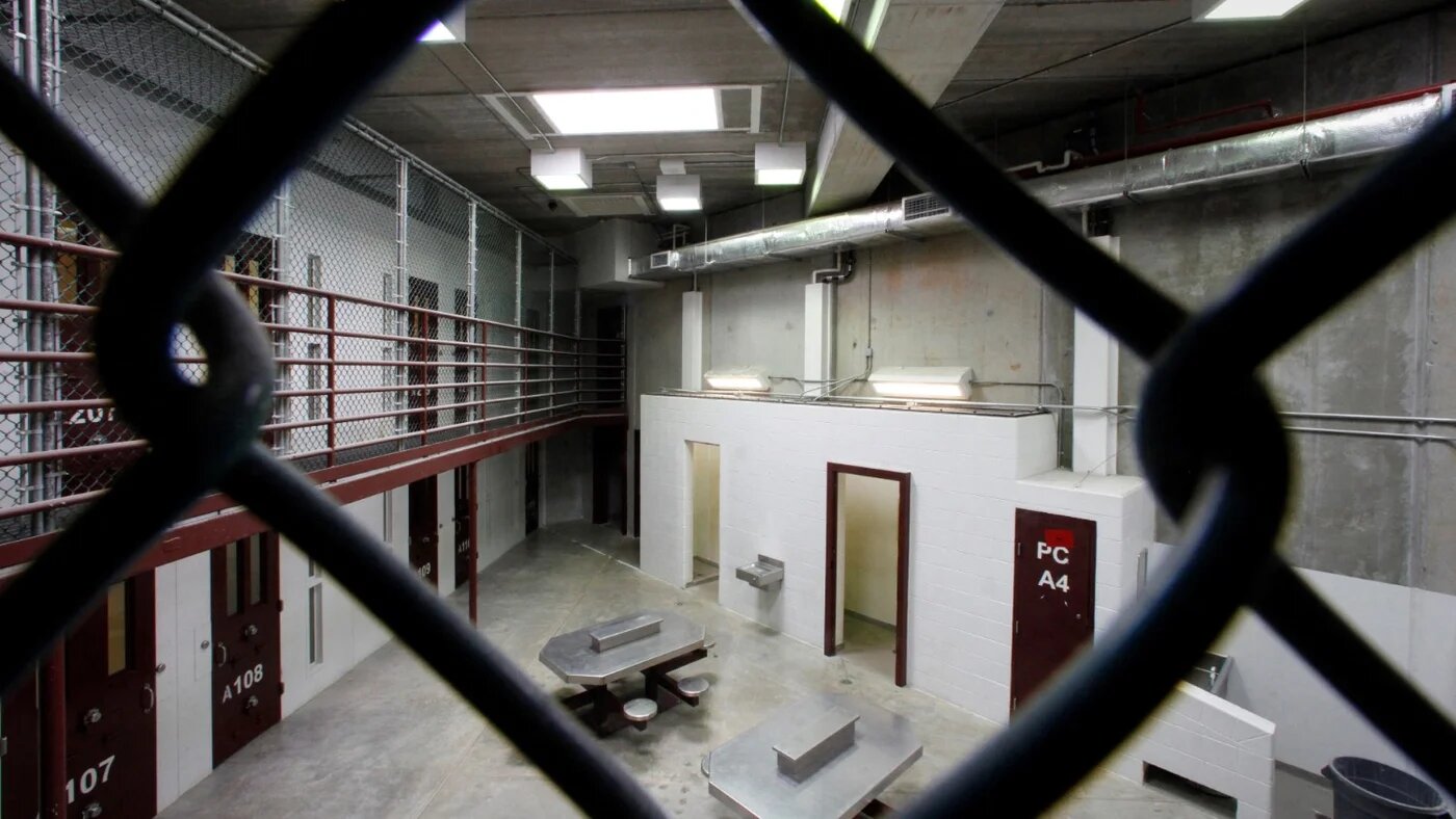 ​​The interior of an unoccupied communal cellblock is seen at Camp VI, a prison used to house detainees at the US Naval Base at Guantanamo Bay, on 5 March 2013