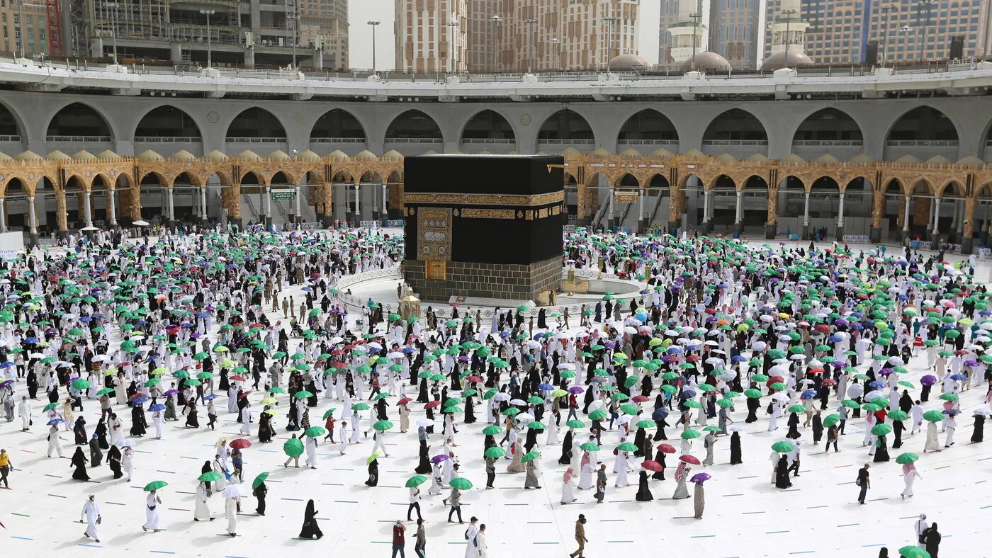 Muslim pilgrims perform the farewell tawaf (circumambulation) around the Kaaba in Mecca, marking the end of the Hajj pilgrimage on 22 July 2021 (AFP)