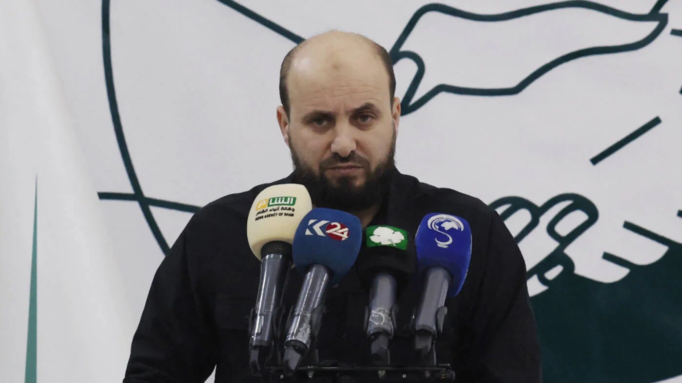 Head of Hay'at Tahrir al-Sham's 'Salvation Government' in northwest Syria Mohammed al-Bashir, holds a press conference in Idlib on 28 November 2024 (AFP/Omar Haj Kadour)