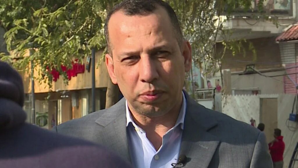Hisham al-Hashemi giving an interview in Baghdad. The Iraqi historian was shot dead on Monday.