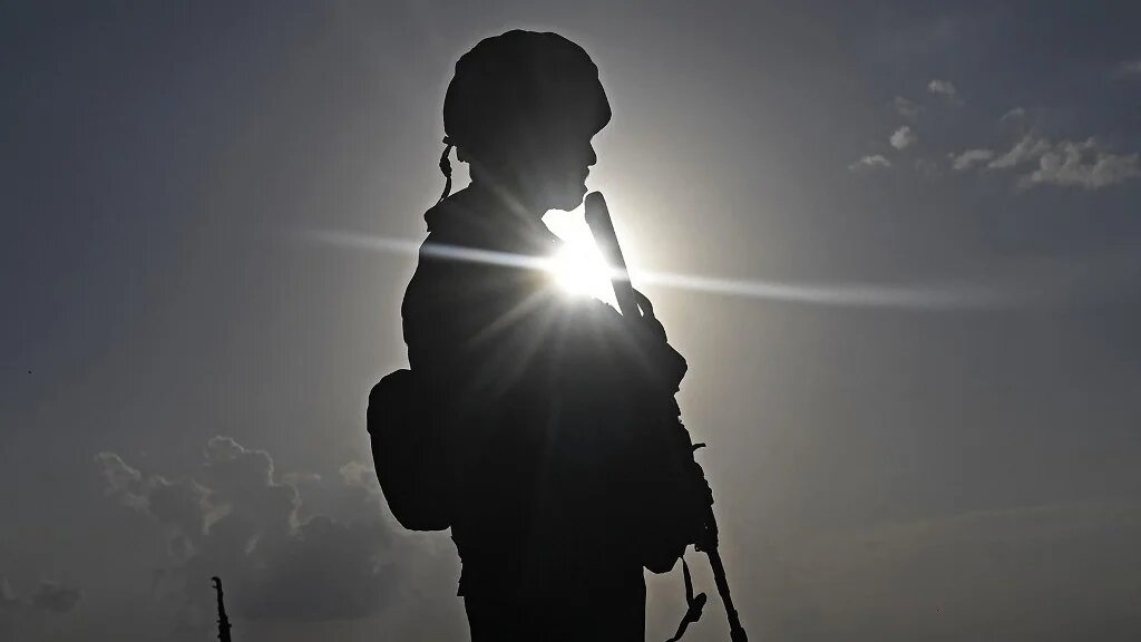 An Indian soldier stands guard near the Line of Control between Pakistan and India, in Indian-administered Kashmir, on 19 May 2025 (Tauseef Mustafa/AFP)