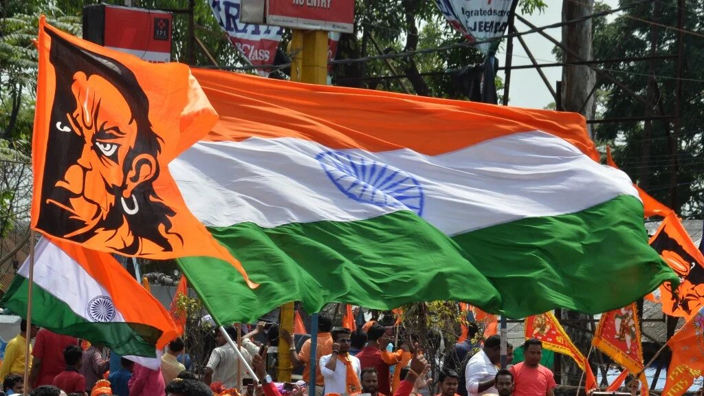 Indian devotees take part in a religious procession to mark the Ram Navami festival in Siliguri on 14 April 2019 (Diptendu Dutta/AFP)