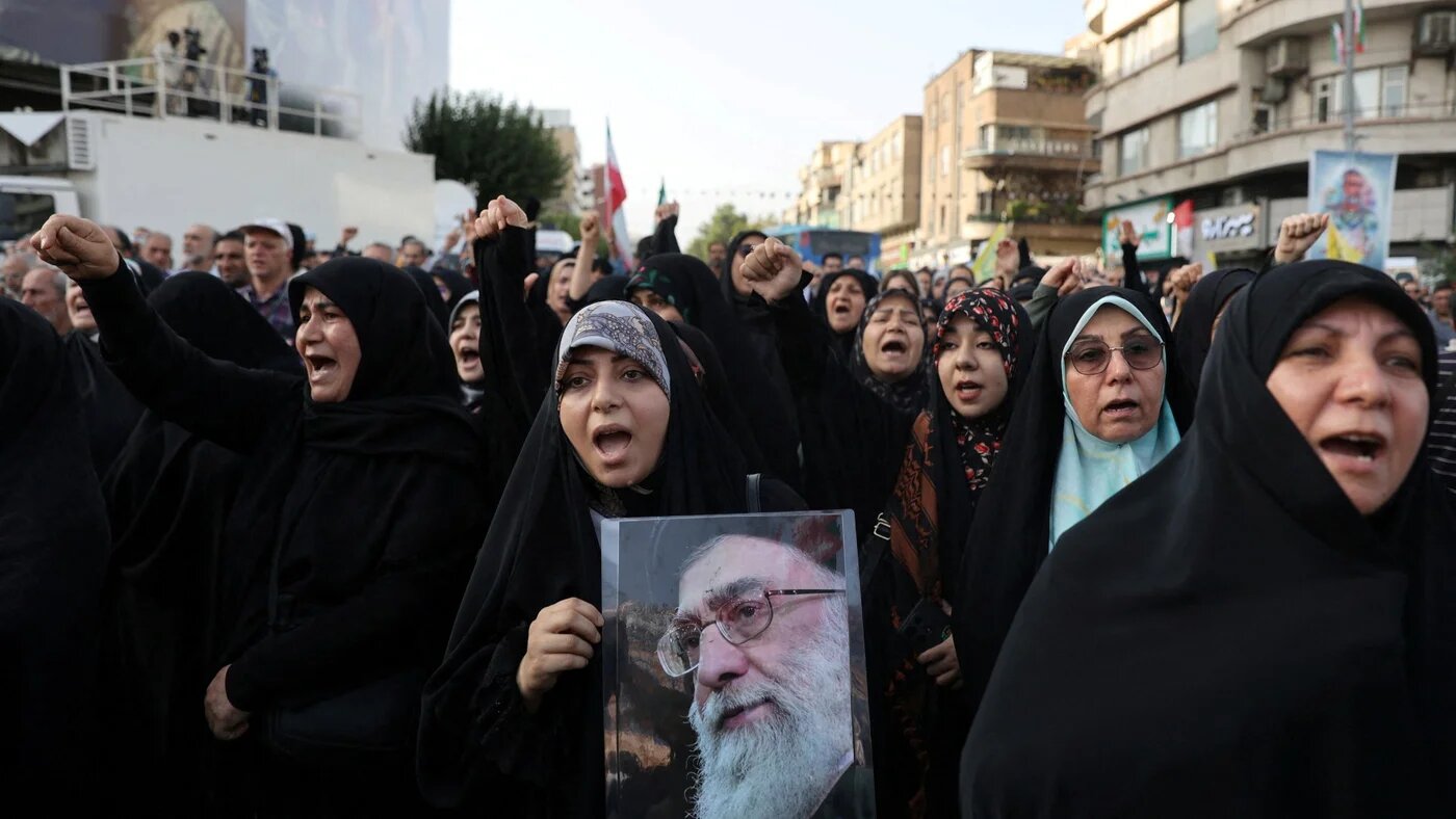 People attend a protest against the US and Israeli attacks in Tehran, 22 June (Majid Asgaripour/WANA via Reuters)