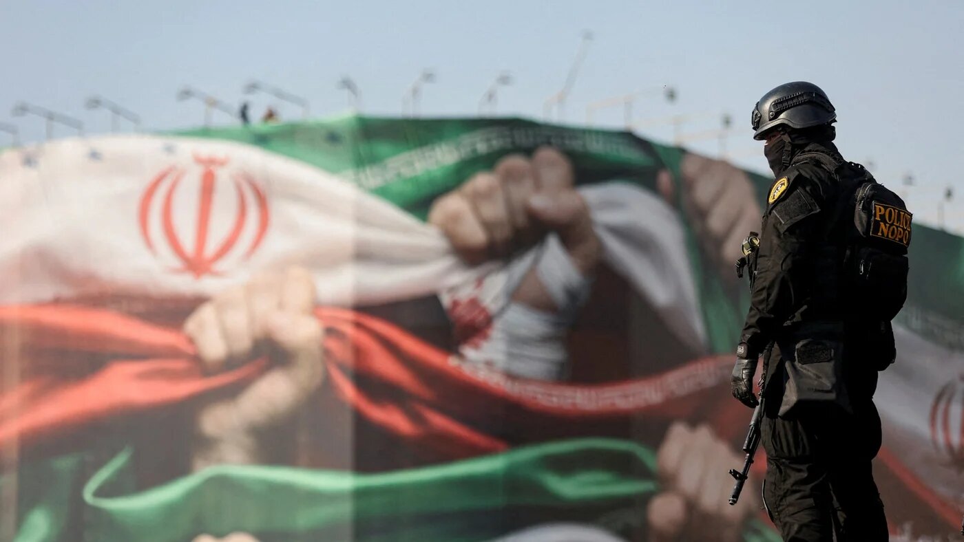 A member of the Iranian police attends a pro-government rally in Tehran, 12 January 2026 (West Asia News Agency via Reuters)