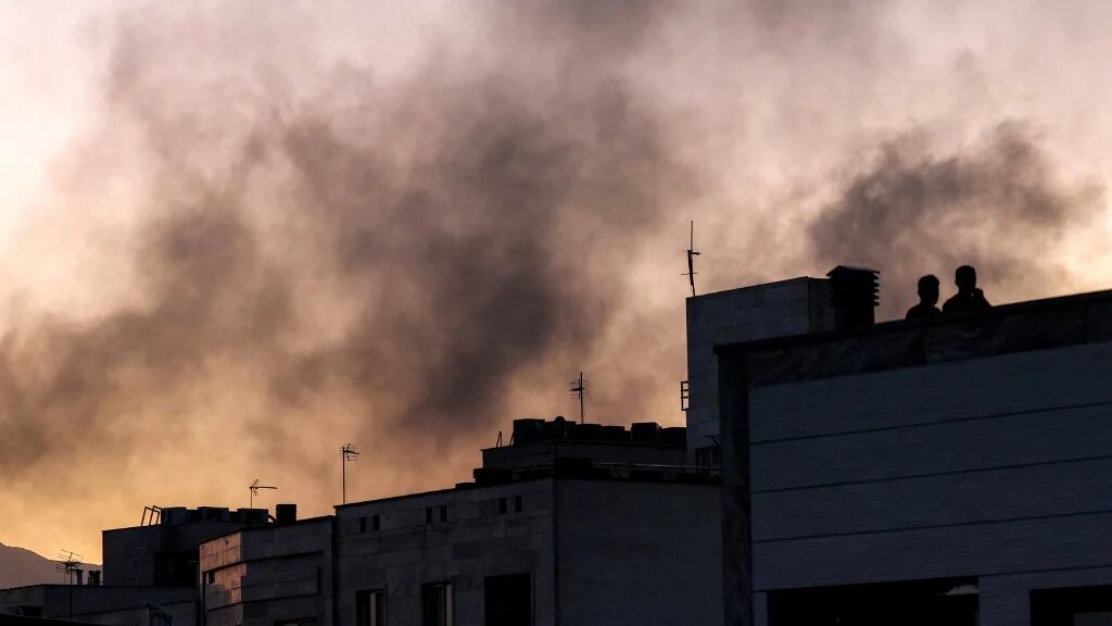 Smoke billows after an Israeli strike in Tehran on 17 June 2025 (Atta Kenare/AFP)