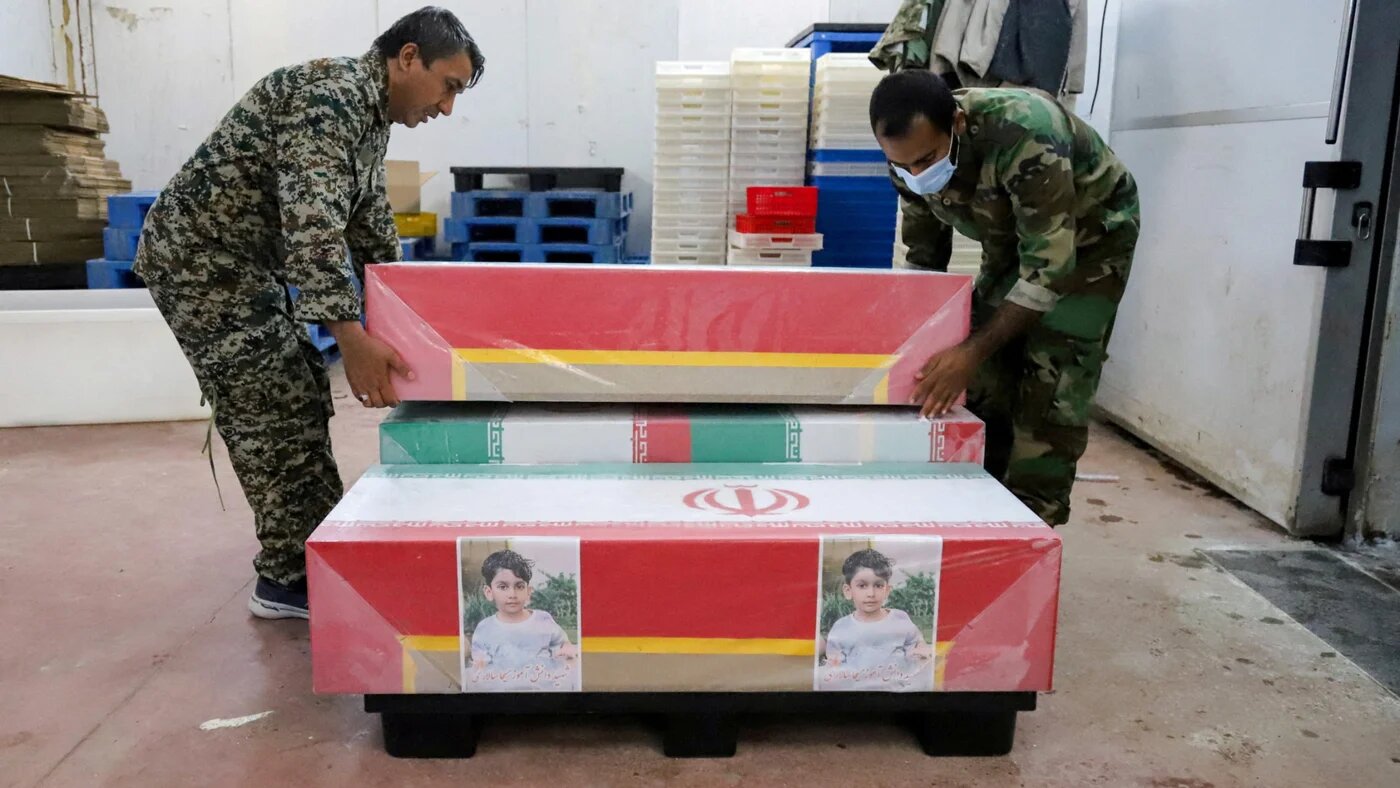 Coffins on the day of the funeral of victims of a reported strike on a school in Minab, Iran, 3 March 2026 (Amirhossein Khorgooei/ISNA/WANA/Reuters)