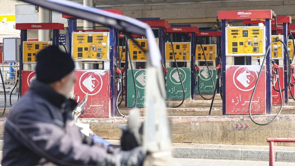 People wait at a gas station in Tehran on December 18, 2023 as fuel distribution across 60 percent of Iran's gas stations is disrupted. The disruption is due to a "possible sabotage," state media reported.