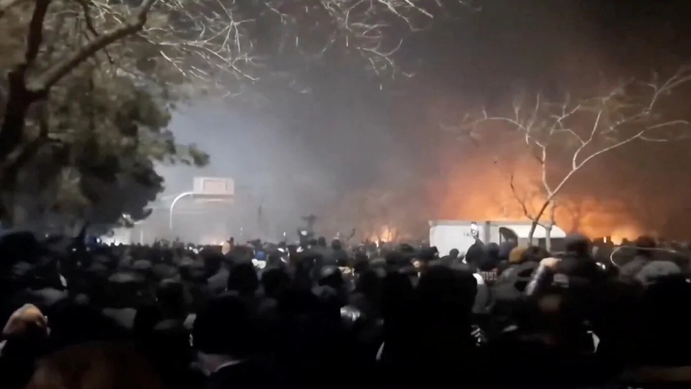 Protesters gather amid evolving anti-government unrest at Vakilabad highway in Mashhad, Razavi Khorasan province, Iran, on 10 January 2026 Social media via Reuters)