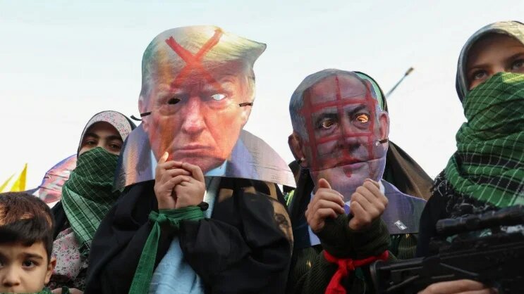 Protesters in Tehran wear masks denouncing US President Donald Trump and Israeli Prime Minister Benjamin Netanyahu on 10 January 2025 (AFP)