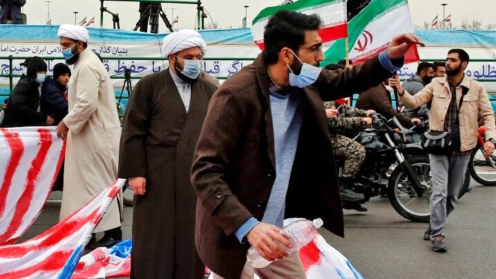 Iranians gather during a rally marking the 43rd anniversary of the 1979 Islamic Revolution, at the Azadi square in Tehran on 11 February 2022.