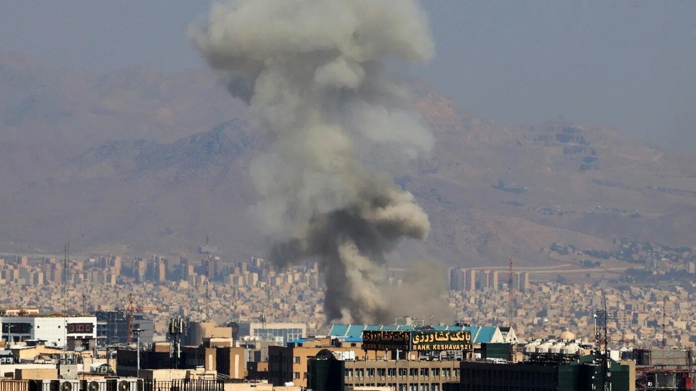 Smoke billows into the sky following an explosion in central Tehran on 15 June 2025 (Atta Kenare/AFP)
