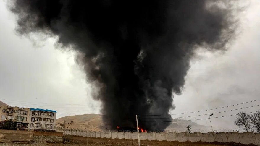 Smoke rises after a strike on an oil refinery in Tehran on 8 March 2026 (AFP)