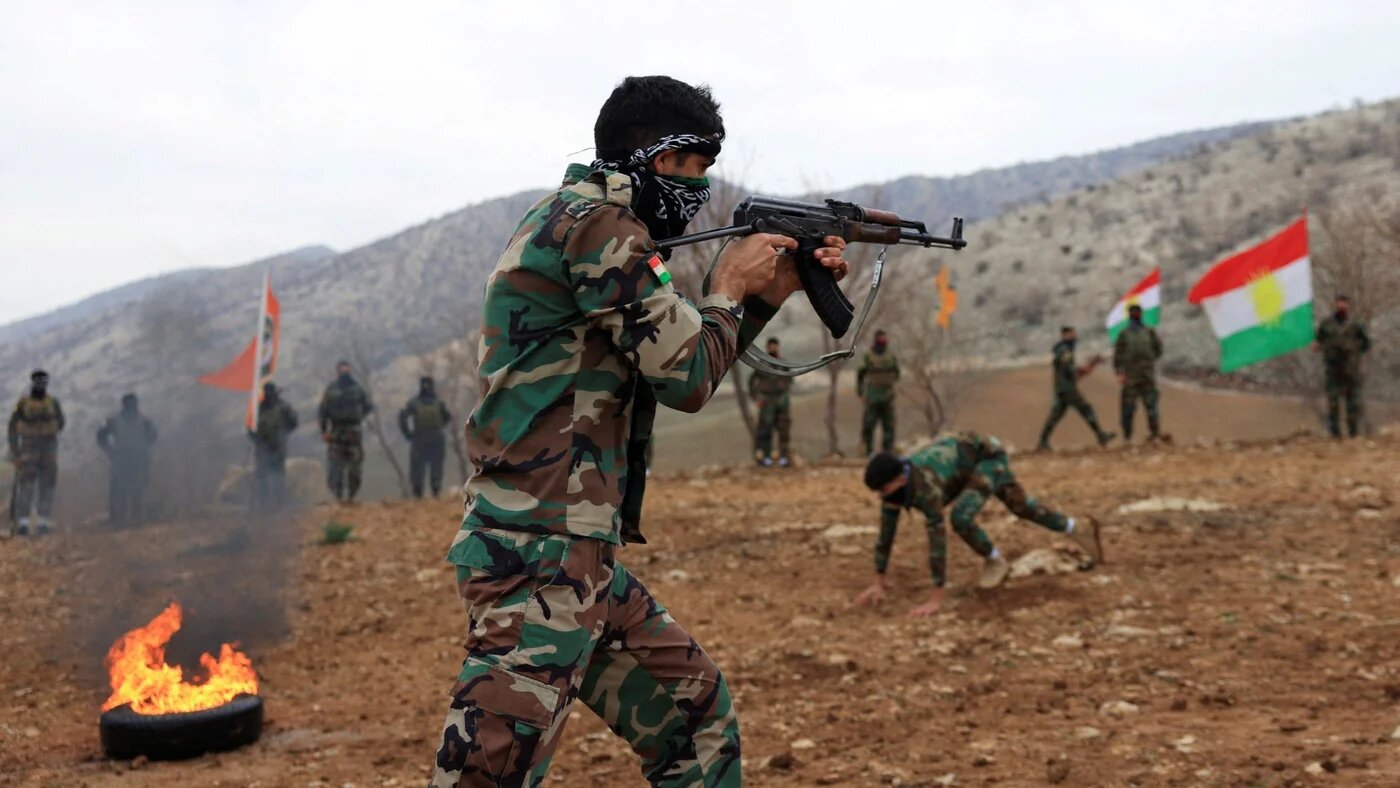 Iranian Kurdish fighters from the Kurdistan Freedom Party take part in a training session at a base on the outskirts of Erbil on 12 February 2026 (Thaier al-Sudani/Reuters)