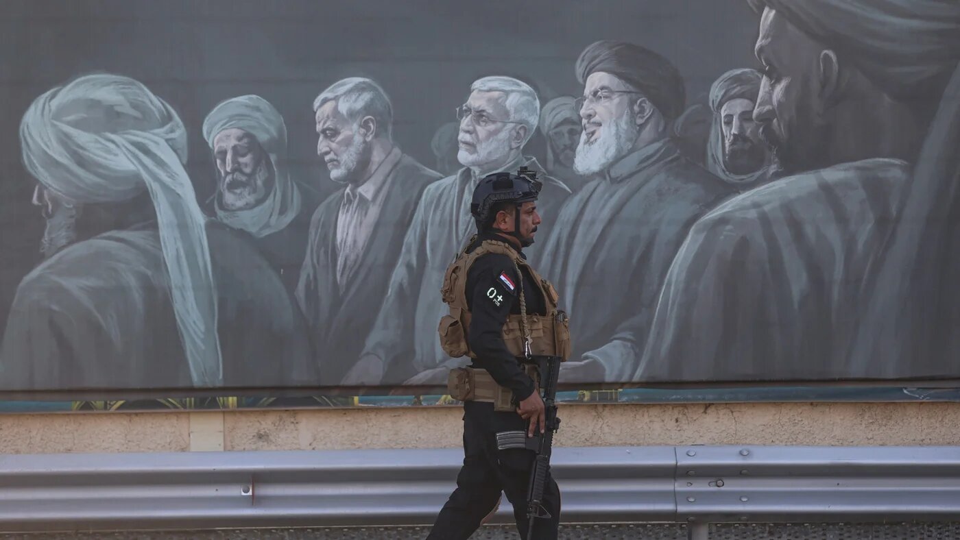 A member of the Iraqi special forces secures the Baghdad International Airport road during the arrival of Iran's Parliament Speaker Mohammad Bagher Ghalibaf in Baghdad on 19 August 2026 (AFP/Ahmad al-Rubaye)