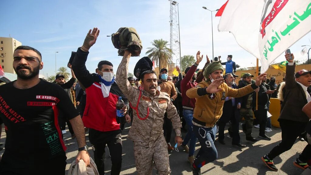 The Iran-backed Hashd al-Shaabi protest outside the US embassy in Baghdad on 1 January 2020