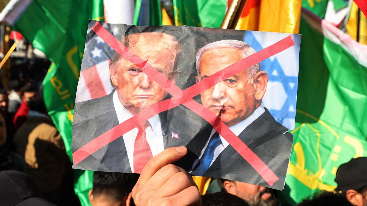 Protesters denounce Israeli Prime Minister Benjamin Netanyahu and US President Donald Trump near the Iranian embassy in Baghdad, Iraq, on 16 January 2026 (Ahmad al-Rubaye/AFP)